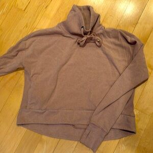 Sweaty Betty London tan cowl neck sweatshirt.